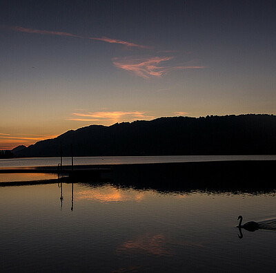 sonnenuntergang über dem alpsee
