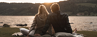 Picknick bei Sonnenuntergang am Alpsee - Alpsee Camping Immenstadt